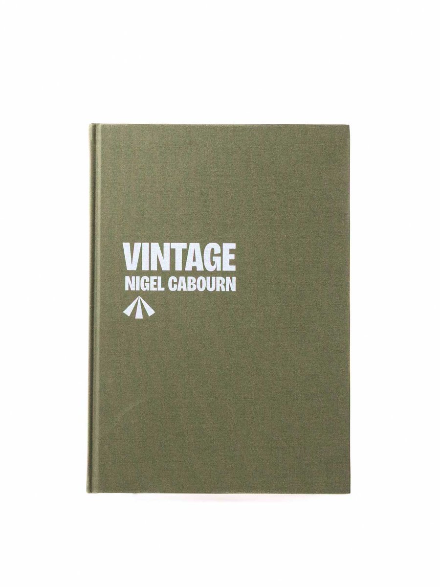 BIOGRAPHY VINTAGE BOOK / NAVY BAG 