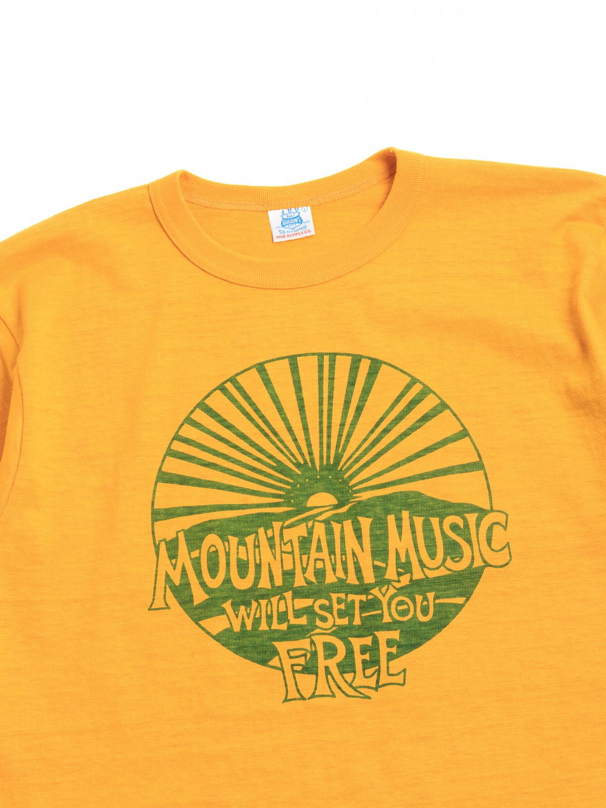 (JG–CS06–6) MOUNTAIN MUSIC T GOLD - Image 2